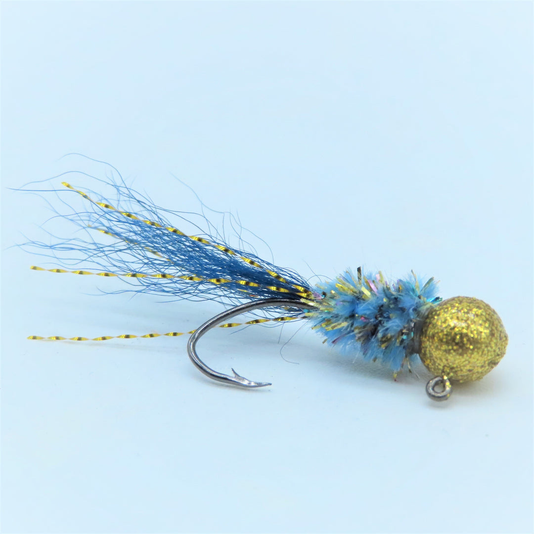 Hand tied crappie jig with a blue/gold chenille body, disco gold jig head, and blue kip  tail. The jig is powder coated with disco gold paint, and tied onto a #4 sickle hook by Ramble Tamble Tackle. This crappie jig measures approx 2 inches in length